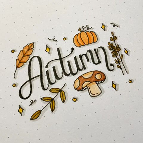 the word autumn written in cursive writing with fall leaves and mushrooms