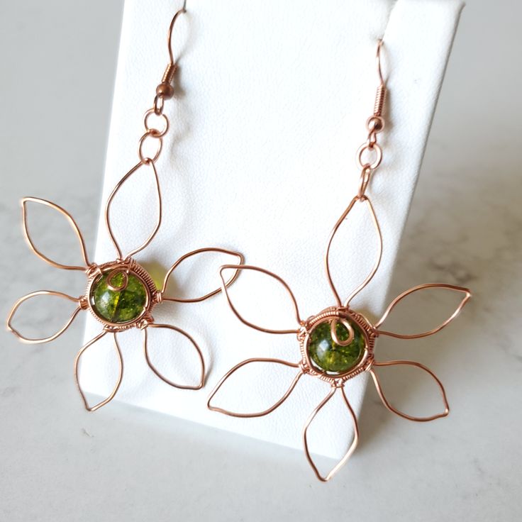 Handmade Copper Wire Wrap Earrings As Gift, Green Metal Flower Jewelry, Green Metal Flower-shaped Jewelry, Adjustable Copper Flower Jewelry, Nature-inspired Flower Jewelry With Ear Wire, Nature-inspired Flower Shape Jewelry With Ear Wire, Handmade Green Wrap Earrings As Gift, Nature-inspired Flower Shaped Ear Wire Jewelry, Nature-inspired Green Flower Earrings For Gifts