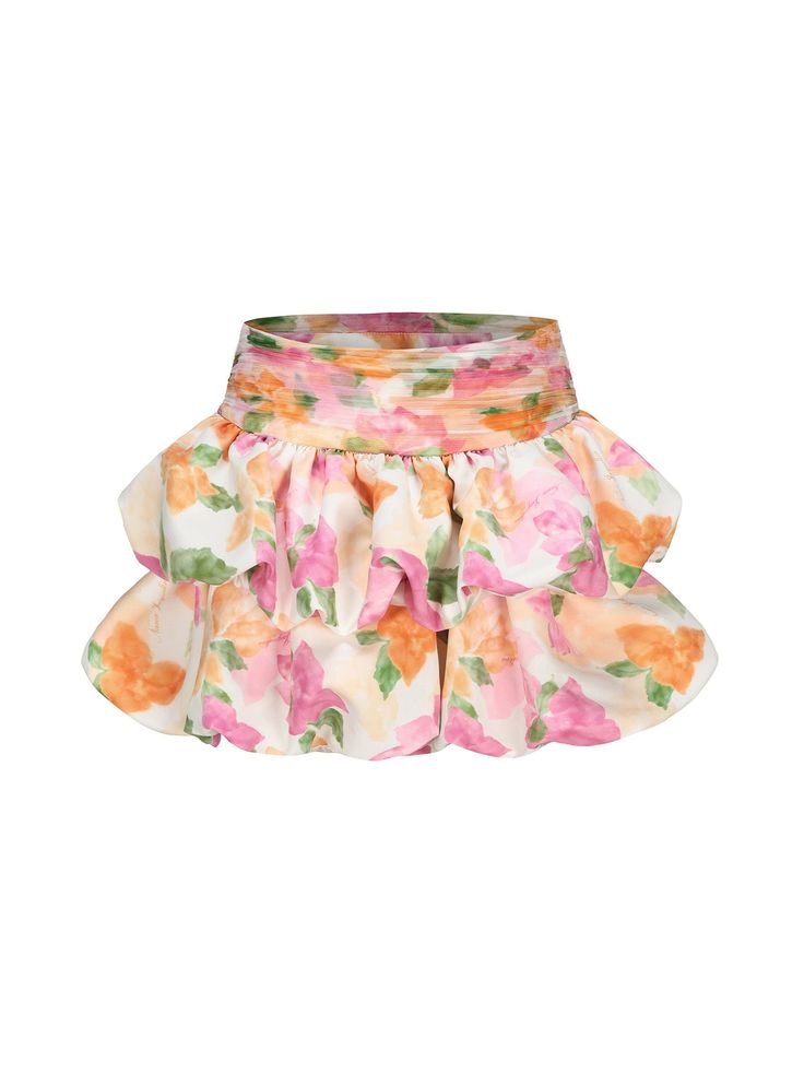 Step into a world of enchantment with The Brielle Skirt, where every inch of fabric is adorned with our signature printed flower design.  The double-layered skirt gracefully captures the natural essence of flowers, enveloping the wearer in a serene ambiance.  Crafted with meticulous attention to detail, the elastic band at the skirt's bottom ensures both comfort and a flawless fit, allowing for effortless movement. For added versatility, the design includes bottoms underneath, providing you with Floral Print Tiered Skirt For Garden Party, Chic Floral Print Tiered Skirt, Chic Skirted Bottoms With Floral Print, Feminine Floral Print Tiered Skirt, Tiered Skirt With Floral Print For Garden Party, Tiered Floral Print Skirt For Garden Party, Elegant Floral Print Bottoms For Brunch, Flowy Tiered Skirt With Floral Print, Chic Tiered Skirt For Garden Party