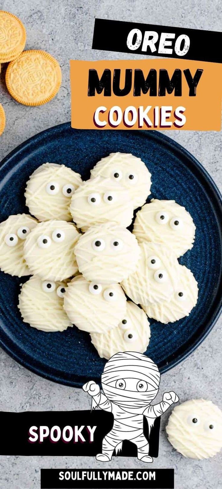 oreo mummy cookies on a blue plate with white frosting