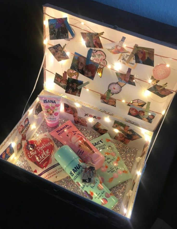 an open box filled with lots of different items and lights on the inside of it