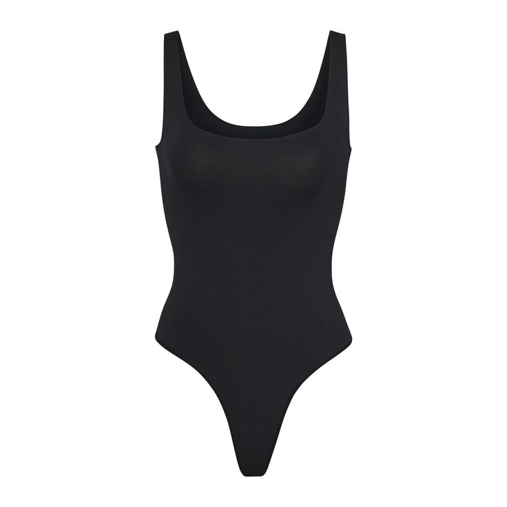 The Smoothing Bodysuit is the perfect everyday essential for light smoothing and support for your waist. Features a double scoop neck and a thong back that makes it seamless under clothing. Green Bodysuit, Bodysuit Tops, Scoop Neck Bodysuit, Cami Bodysuit, Square Neck Bodysuit, Bodysuit Black, Sleeveless Bodysuit, Black Bodysuit, Long Sleeve Bodysuit