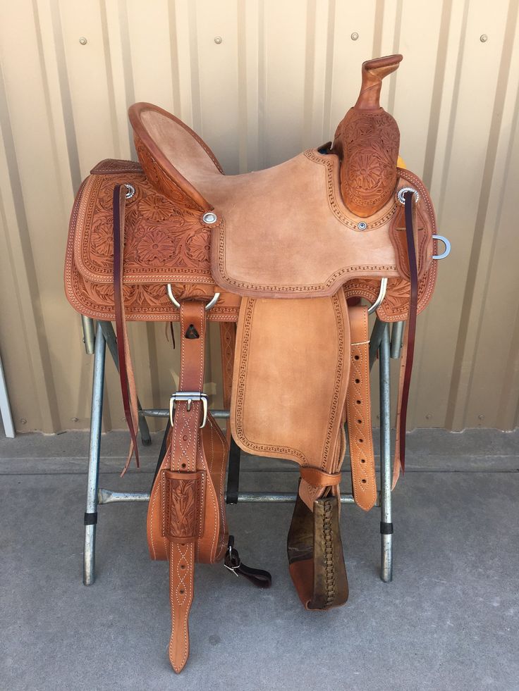 a saddle that is sitting on the ground