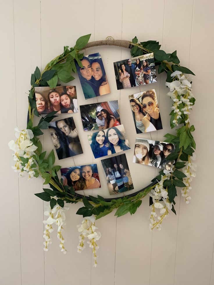 a collage of photos hanging on a wall with flowers and greenery around it