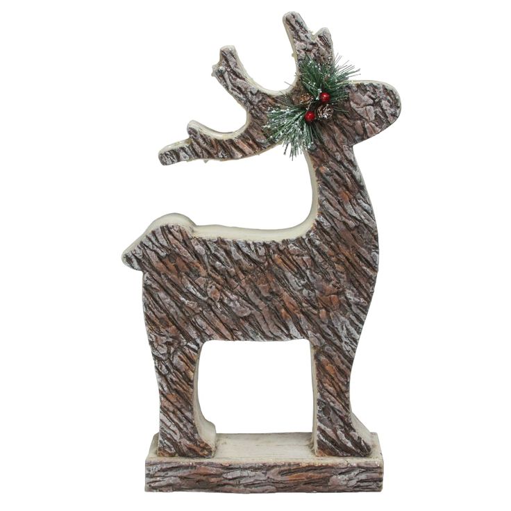 a deer statue with a christmas wreath on its antlers