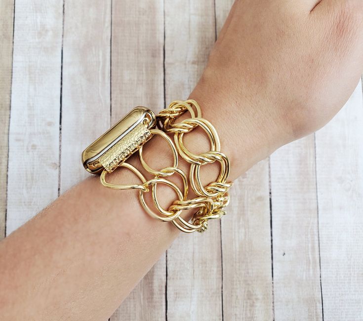 "Gold Chain Apple Watch Band 38 40 42 44mm Women Unisex Double Wrap Fashion Silver Chain Bracelet for iWatch 12345 Nike Hermes Editions Super elegant and exquisite handmade chain link apple watch bracelet. Made to create a unique look to your favorite watch and make you feel special during all day and even night. The bracelet is made from gold plated brass chain links and decorated with gold plated details , chain extension and lobster claw clasp. This bracelet is designed to fit wrist sizes fro Adjustable Gold Watch Band With Solid Link Construction, Gold Metal Apple Watch Band As Gift, Adjustable Gold Metal Apple Watch Band, Adjustable Gold Metal Watch Bands, Adjustable Metal Gold Apple Watch Band, Gold Adjustable Metal Watch Accessories, Gold Apple Watch Band With Extender As Gift, Gold Metal Apple Watch Band With Extender, Gold Chain Link Apple Watch Band With Bracelet Strap