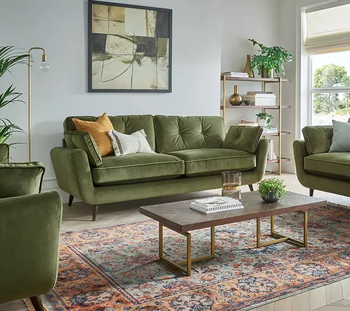 a living room filled with furniture and decor