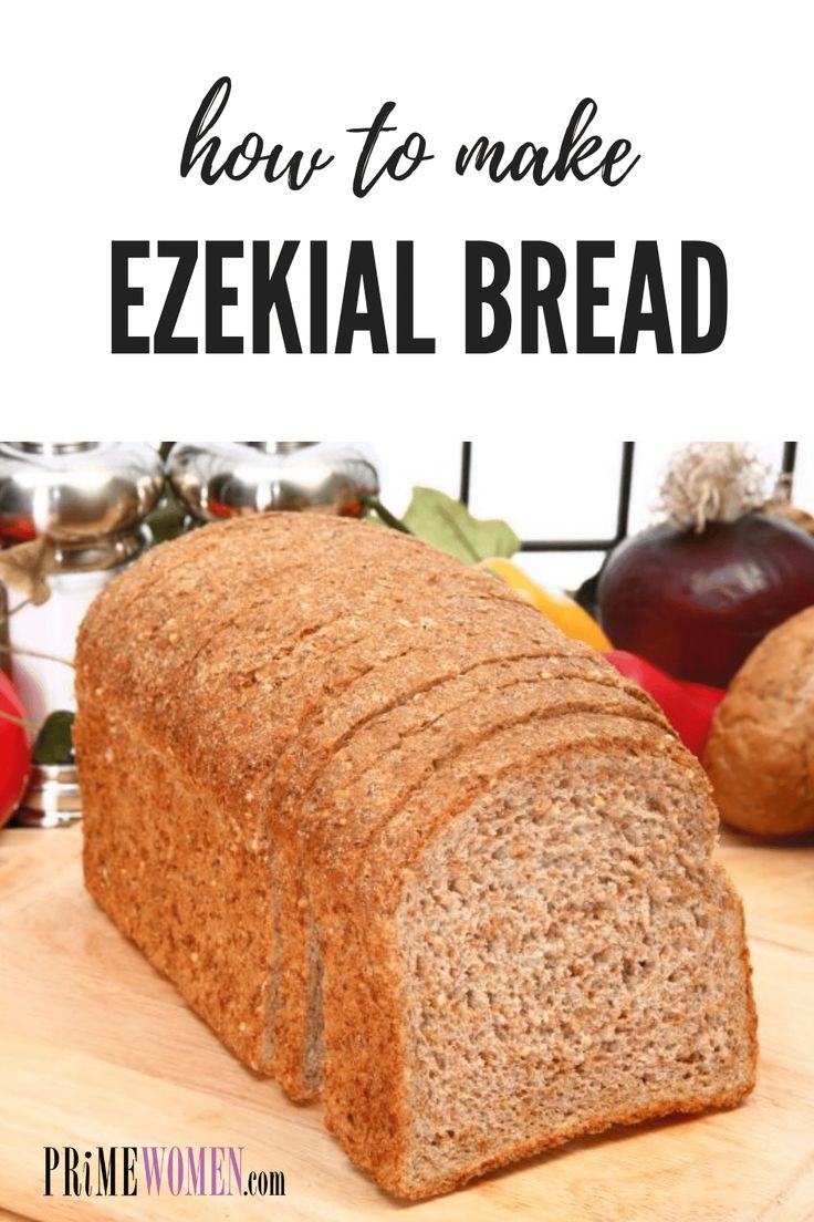 a loaf of bread sitting on top of a wooden cutting board