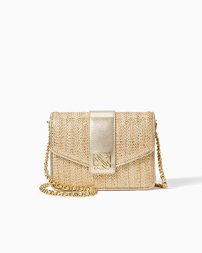 Textured herringbone crossbody bag with a gold metal chain strap and logo detail. Bag measures 8"W x 6"H x 2 1/4"D with a 22" crossbody drop.  Spot clean only. Imported. Complete your look with our gorgeously textured Dobson Crossbody Bag. Spring Crossbody Clutch With Chain Strap, Gold Crossbody Shoulder Bag With Chain Strap, Chic Gold Crossbody Shoulder Bag, Classic Gold Flap Bag With Chain Strap, Gold Bags With Gold Chain In Classic Style, Chic Rectangular Bag With Gold-tone Logo Plaque, Chic Gold Flap Bag With Adjustable Strap, Chic Wallet On Chain With Gold-tone Logo For Everyday, Chic Everyday Flap Bag With Gold-tone Logo Plaque