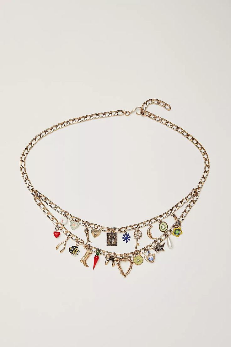 Lucky Charm Chain Belt | Free People Trendy Multi-strand Charm Necklaces, Trendy Party Charm Necklaces With Chain, Trendy Party Charm Necklace With Chain, Trendy Party Charm Necklace, Trendy Chain Necklace With Dangling Charms, Trendy Party Charm Necklaces, Trendy Charm Necklaces For Party, Trendy Multi-strand Metal Charm Necklaces, Trendy Metal Charm Necklaces For Party