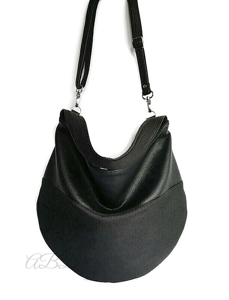 "Black hobo bag Black handbag Black vegan bag Large shoulder bag Slouchy hobo purse Slouchy hobo bag Hobo purse bag Handbag women Bag woman Cross body bag Cross body purse Vegan purse black Black bag large This is a comfortable and capacious bag. Women handbag.Its simple and functional character allows you to fit everything you need inside throughout your entire day. It is voluminous yet neat, making it a great addition to a loose fitting and elegant clothing. This vegan purse bag is made for wo Black Large Capacity Hobo Bag, Versatile Black Hobo Bag With Removable Pouch, Black Pouch Hobo Bag For Everyday, Everyday Black Pouch Hobo Bag, Black Hobo Bag For Travel, Black Hobo Travel Bag, Black Hobo Bag With Removable Pouch, Versatile Black Hobo Bucket Bag, Black Hobo Bag With Large Capacity