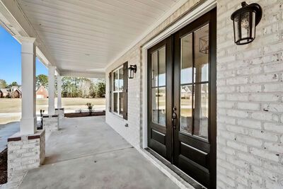 the front porch is clean and ready for us to use as an entrance way in this home