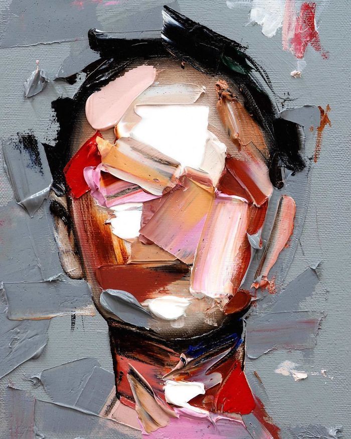 an abstract painting of a man's face with multiple colored patches on his head