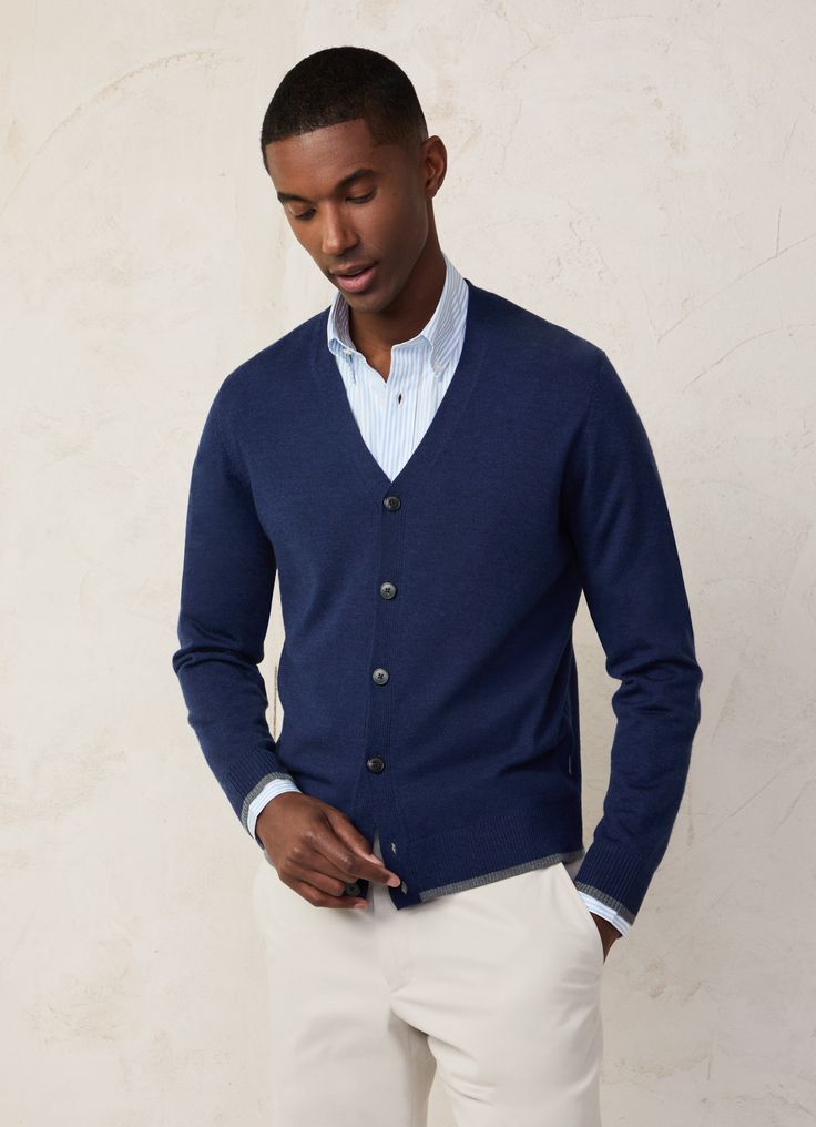 - Cardigan in 100% cashmere fabric. - V-neck. - Button fastening on the front. - Ribbed detail with trimming on neck, cuffs, and hem. - FAÇONNABLE logo label on side seam. - Oversized buttons with engraved logo. Classic V-neck Fine Knit Cardigan, V-neck Cardigan With Button Cuffs For Work, Formal Wool V-neck Cardigan, Wool V-neck Sweater With Buttons, Cashmere V-neck Outerwear With Buttons, Classic Winter Cardigan For Business, Classic V-neck Outerwear With Buttons, Business Cardigan With Buttons And Long Sleeves, Business Long Sleeve Button Cardigan