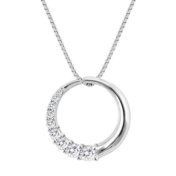 This modern Journey of Love circle design  measuring 5/8&quote; in diameter  is both beautiful and classic. Nine round diamonds  at approximately .26 carat total weight  glimmer in a 14 karat white gold setting. A lovely 18&quote; box chain  also in 14 karat white gold  completes the look. Luxury Diamond Charm Necklace With Round Pendant, Elegant Silver Full Circle Necklace, Sterling Silver Diamond Necklace With Prong Setting, Sterling Silver Round Pendant Diamond Necklace With Prong Setting, Sterling Silver Diamond Necklace With Prong-set Round Pendant, Sterling Silver Diamond Necklace With Round Pendant, White Gold Diamond Full Circle Necklace, White Gold Diamond Necklace Full Circle, Round Cut Diamond Necklace With Polished Finish