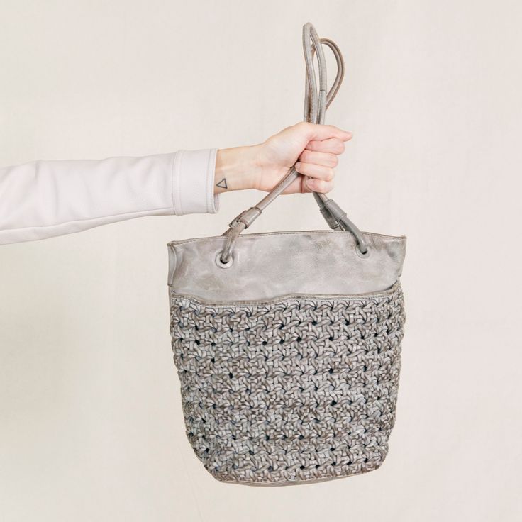 If you love the look and feel of our unstructured Cate and Neela bags, then feast your eyes on the new Clover shoulder bag. With the same woven exterior, a slightly larger body, and comfortable rolled shoulder straps, the Clover is the perfect blend of styles. Call it a small-scale tote or a bucket-style shoulder bag, we know you’ll love it either way! Our signature interior organization and soft top handles are the icings on the cake. 😊 #laticoleathers #leather #leatherbag #clovertote On-the-go Woven Leather Pouch Shoulder Bag, On-the-go Woven Leather Shoulder Bucket Bag, Everyday Bucket Hobo Bag With Braided Handles, Woven Leather Bucket Shoulder Bag For Evening, Crochet Shoulder Bag With Detachable Handle For Everyday, Crochet Shoulder Bag With Detachable Handle, Woven Leather Tote Bucket Bag, Woven Leather Double Handle Bucket Bag, Chic Leather Crochet Shoulder Bag