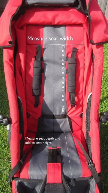 the back end of a red backpack with measurements on it