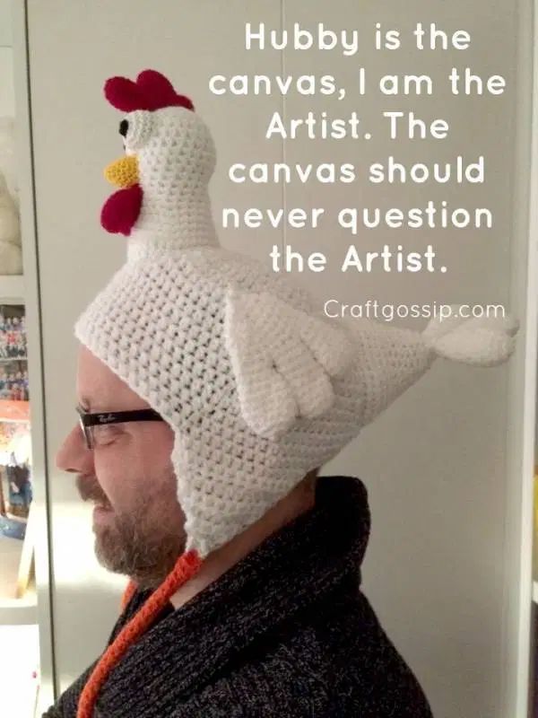 a man wearing a crochet chicken hat with a quote on it that says, hubby is the canvas i am the artist