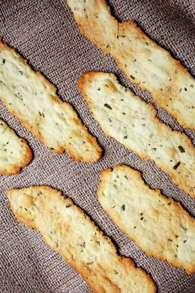 crackers are lined up on a cloth