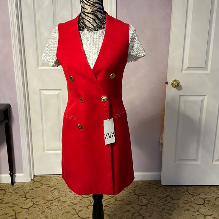 Brand New Sleeveless Blazer Size Xs. Red Collar Brand New With Tag Pockets On Side Chic Red V-neck Outerwear, Red Fitted Sleeveless Outerwear, Fitted Red Sleeveless Outerwear, Red Sleeveless Fall Outerwear, Red Sleeveless Outerwear For Fall, Fitted Red Vest Outerwear, Red V-neck Summer Outerwear, Red Sleeveless Vest Outerwear, Red Sleeveless Winter Vest