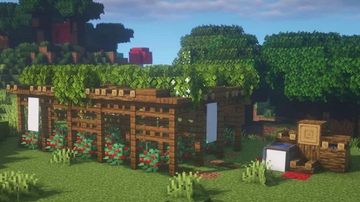 an image of a minecraft village with lots of trees