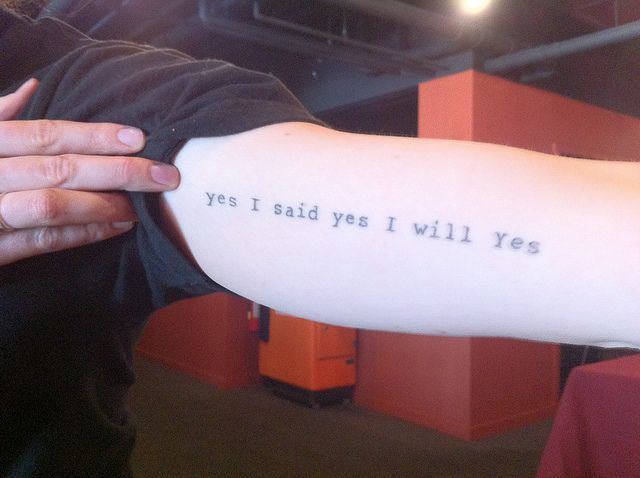 a person with a tattoo on their arm saying yes i said yes i will yes