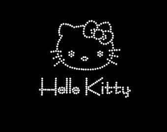 the hello kitty logo is made up of small white dots