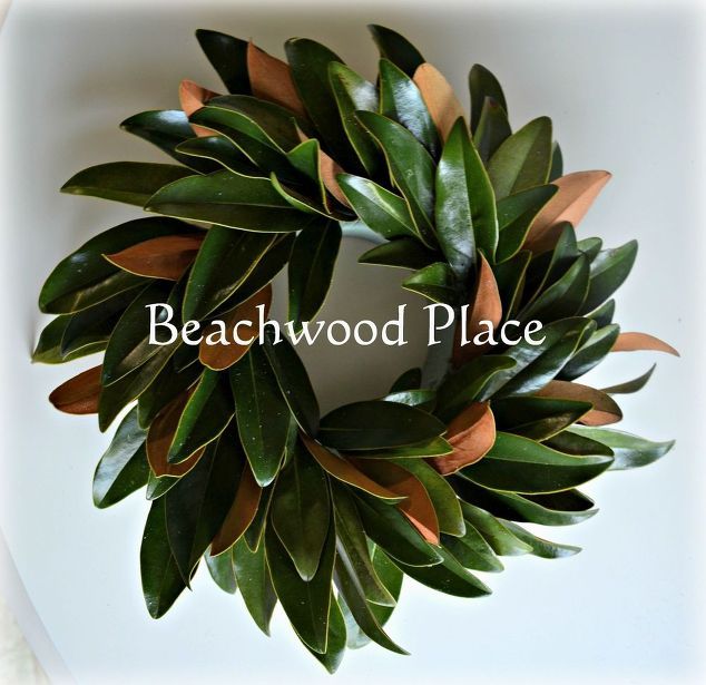 a wreath made out of leaves with the words beachwood place on it