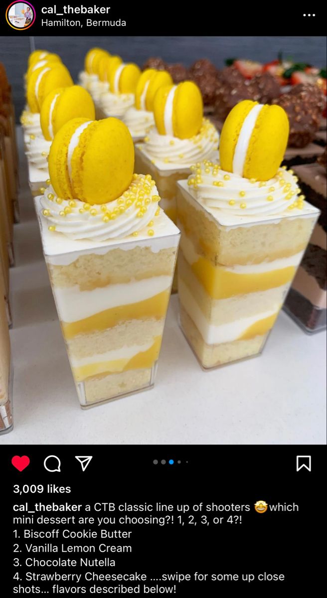 there are many desserts on the table with yellow and white frosting in them