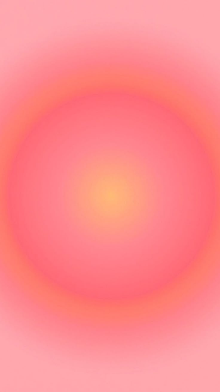 an orange and pink circle on a pink background