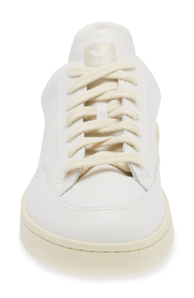 Throwback style takes a clean-cut approach with this leather sneaker signed off by a signature stitched 'V' logo on the sidewall. Lace-up style Removable insole Leather upper/recycled-polyester textile lining/rubber, synthetic and recycled-rubber sole Made in Brazil This brand has B Corp certification, representing business practices with emphasis on social and environmental performance, accountability and transparency This brand meets Nordstrom Responsible Brands criteria: brand adheres to resp Leather Sneakers With Contrast Stitching And Round Toe, White Casual Sneakers With Contrast Stitching, Casual White Sneakers With Contrast Stitching, Leather High-top Sneakers With Contrast Stitching, Off White Leather Sneakers With Rubber Sole, Cream Leather Sneakers With Stitched Sole, Modern White Fade-resistant Sneakers, Cream Low-top Sneakers With Stitched Sole, Leather Low-top Sneakers With Contrast Stitching