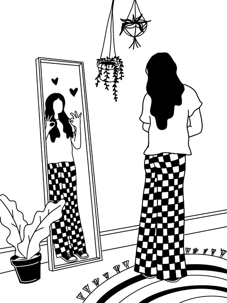 a woman looking at herself in the mirror