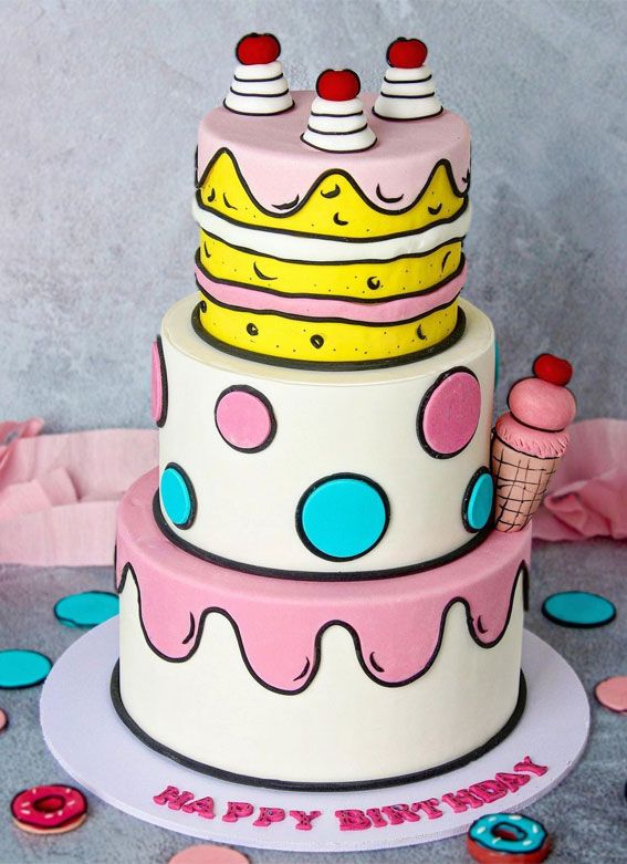 a three tiered birthday cake with ice cream and sprinkles on it