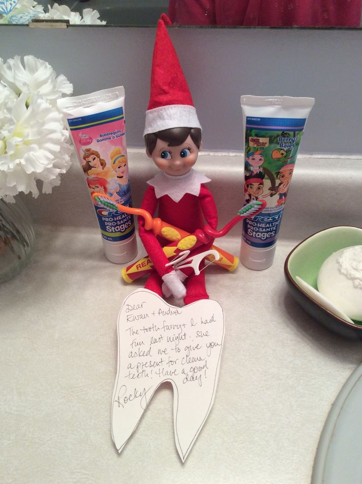 an elf is sitting on top of toothpaste