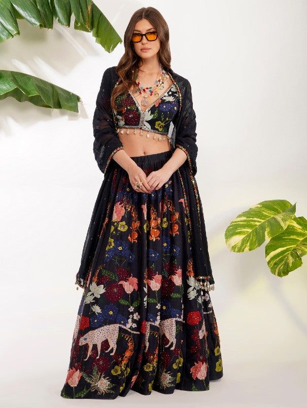 Black Flora Fauna Lehenga Set (Set of 3) By Devyani Malhotra now available at Trendroots Flower Print Lehenga, Shell Tassels, Print Lehenga, Chanderi Dupatta, Black Lehenga, Flora Fauna, Yellow Fabric, Mirror Work, Embroidery Work