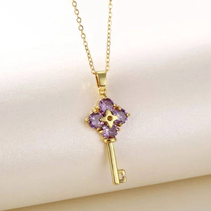 Material 18k Gold Plated Simulated Diamonds. Purple Flower Key Necklace Elegant Lavender Flower Shaped Jewelry, Elegant Flower Shaped Amethyst Jewelry, Elegant Purple Flower-shaped Necklace, Purple Jewelry With Flower Charm For Mother's Day, Purple Flower-shaped Formal Jewelry, Elegant Lavender Flower Jewelry, Purple Gold Plated Necklace For Gift, Purple Gold-plated Necklace As A Gift, Purple Gold-plated Necklace For Gift