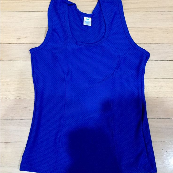 Brand New Jersey Material Sleeveless Top In A Royal Blue. Has Mesh Details In Black And It’s A V-Neck Cut And It’s Stretchy. Really Cute And New Comes In A Clear Bag. Will Ship Right Away. Blue Stretch Sports Vest, Blue Scoop Neck Sporty Tank Top, Blue Scoop Neck Vest Top, Sporty Blue Scoop Neck Tank Top, Blue Summer Workout Vest, Blue Workout Vest For Summer, Blue Cami Tank Top, Blue Stretch Sleeveless Vest, Blue Stretch Cami Tank Top