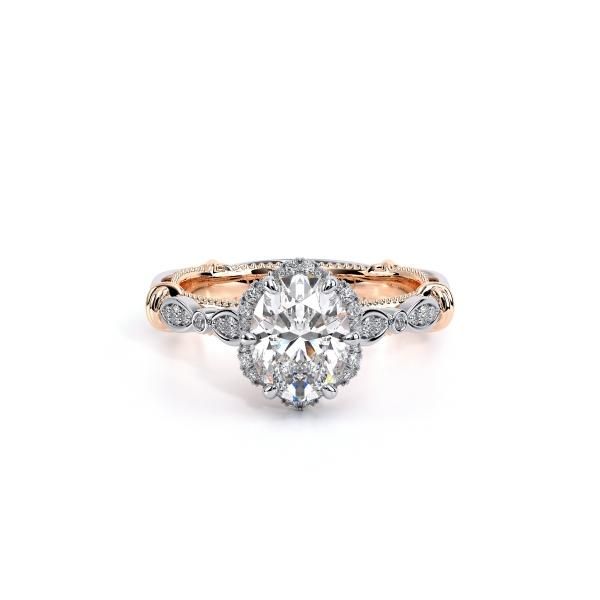 an oval shaped diamond ring with two tone gold band and diamonds on the sides, set in