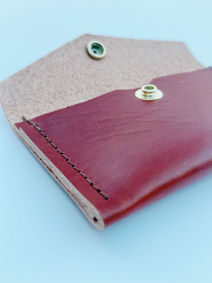 Introducing our “Mini” Willow wallet! The smaller, card holder version of our Willow Wallet, we constructed this beauty with three leather options; a beautiful, rust-colored leather, a black bridle leather, and a brown, oil-tanned leather. The mini card holder is made up of 2 pockets, both of which securely hold cash & cards, without movement (We’ve tested it for you), stitched with heavy-duty upholstery thread. Made by us, here in the USA. Watch the video to see some of the many steps involved Burgundy Bifold Wallet As Gift, Burgundy Leather Wallet As Gift, Burgundy Leather Wallets As Gift, Everyday Burgundy Leather Wallets, Burgundy Leather Wallet For Everyday Use, Burgundy Leather Wallets For Gift, Brown Vegetable Tanned Leather Wallet With Card Slots, Versatile Soft Leather Wallets For On-the-go, Brown Leather Trifold Wallet Hand-stitched