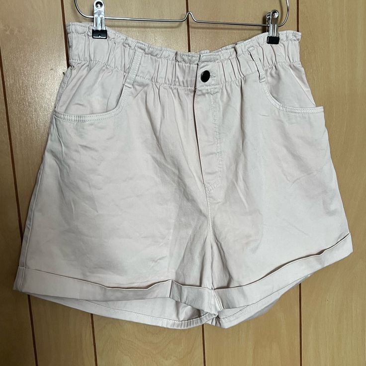 H&M New With Tags Beige Shorts. Size Large With Lots Of Stretch In The Waist. Trendy Beige Paperbag Waist Bottoms, Beige Shorts For Everyday Spring Wear, Everyday Beige Shorts For Spring, Trendy Beige Paperbag Waist Shorts, Beige Shorts For Everyday Summer Wear, Beige Cotton Paperbag Waist Shorts, Beige Summer Shorts For Everyday, Everyday Beige Shorts For Summer, Beige Everyday Summer Shorts