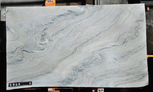 a marble slab is shown in the process of being polished and ready to be used