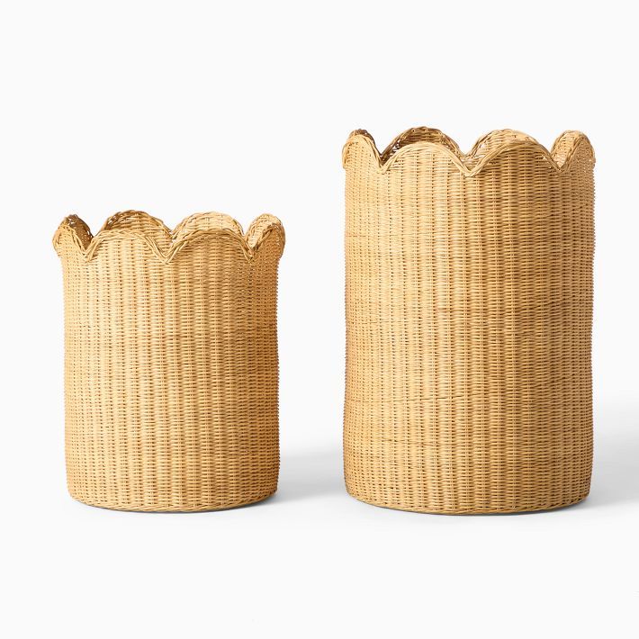 two woven baskets sitting next to each other