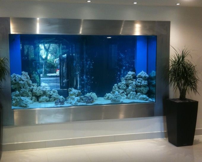 an aquarium in the middle of a lobby