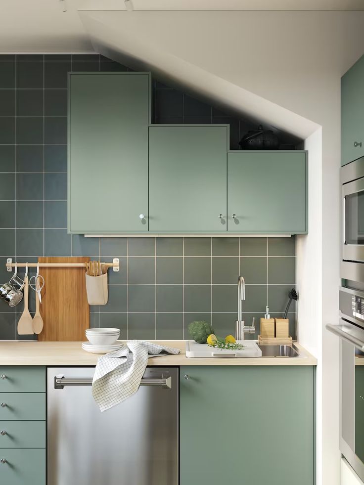 A sage green kitchen with NICKEBO fronts - IKEA CA Green Ikea Kitchen, Wooden Mobile, Organized Bed, Furniture Sales, Sage Green Kitchen, Ikea Food, Bathroom Furniture Storage, Potted Plants Outdoor, L Shaped Kitchen