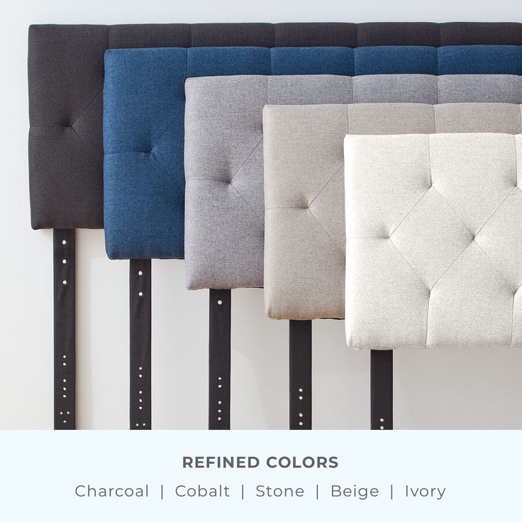 four different colored upholstered headboards are lined up against the wall