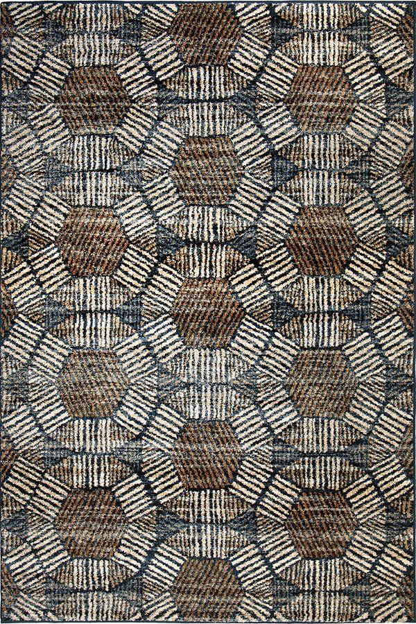 a brown and white rug with an abstract design