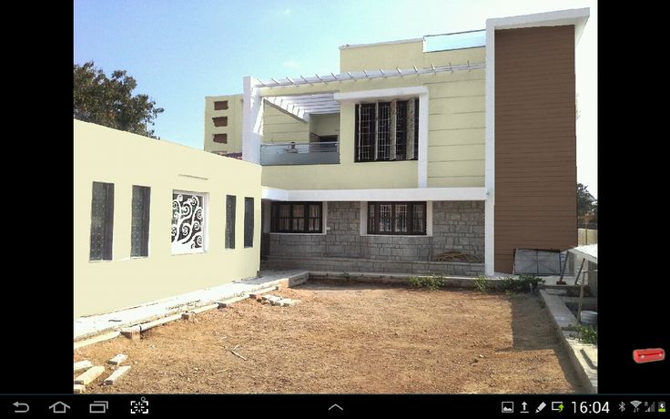 an image of a house being built in the middle of the day with no people around it