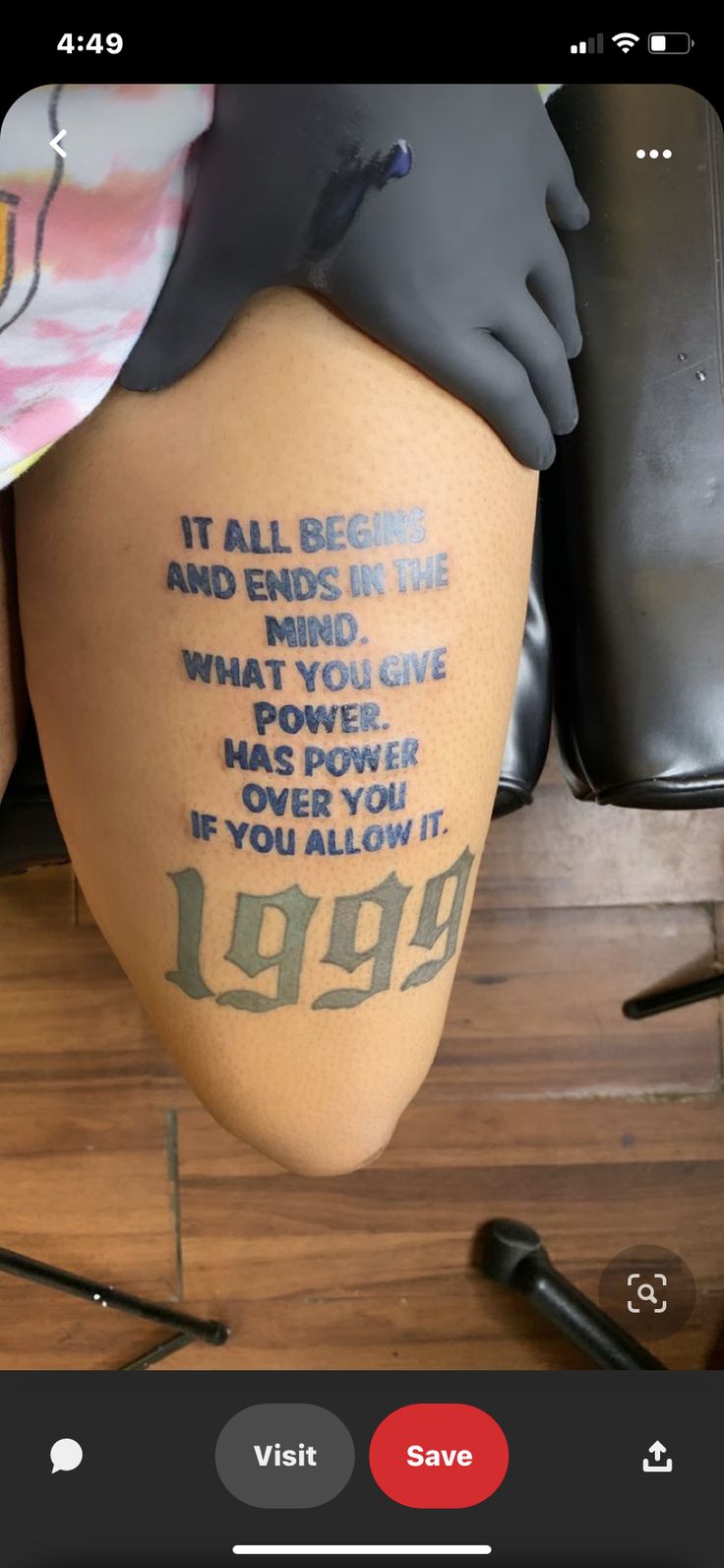 a person with tattoos on their legs and the words, it all begin and end time