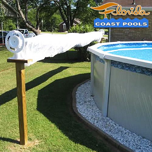 an above ground swimming pool is shown in front of the florida coast pools logo and sign