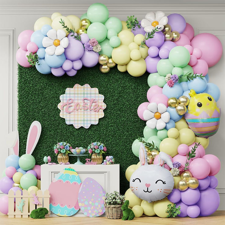 an easter themed party with balloons, flowers and bunny ears on the wall in front of it